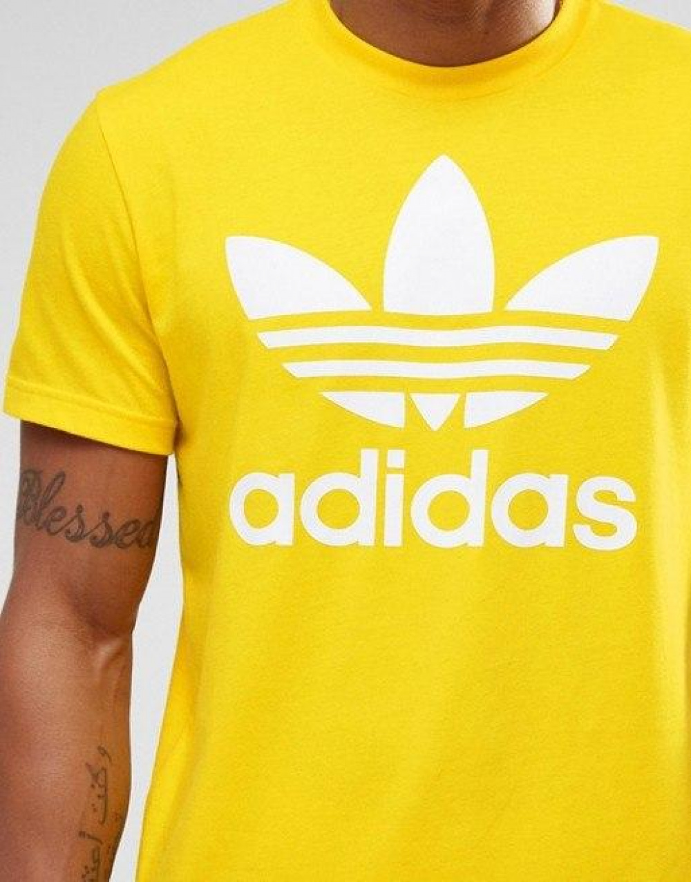 camiseta adidas trefoil amarela