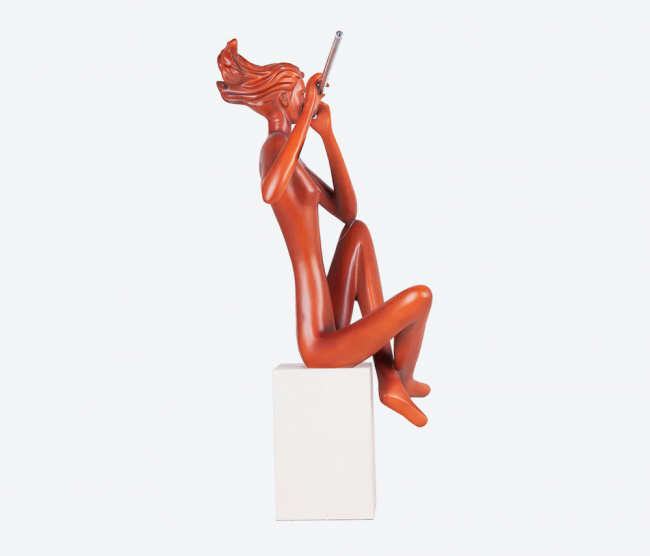Escultura Flautista