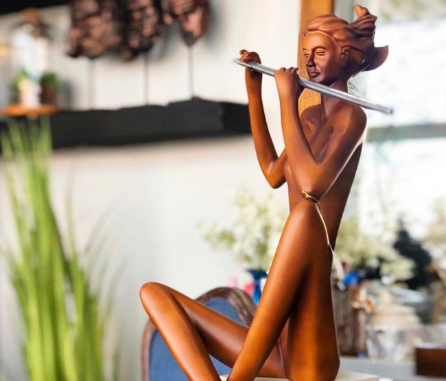 Escultura Flautista