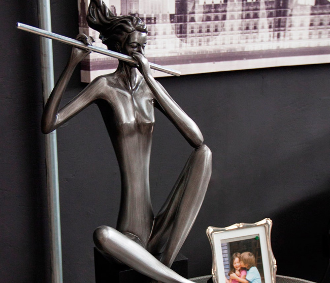 Escultura Flautista