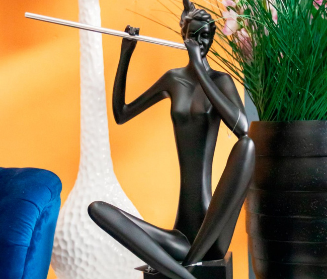 Escultura Flautista