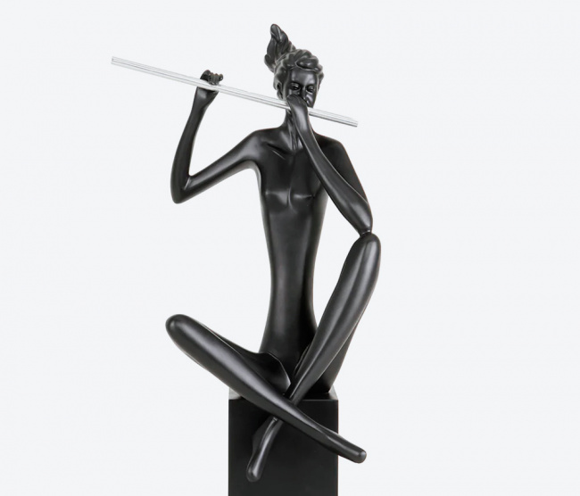 Escultura Flautista