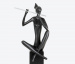 Escultura Flautista