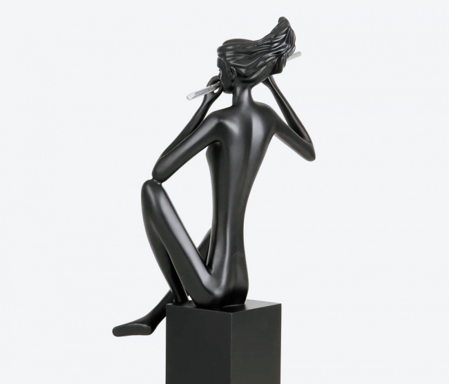 Escultura Flautista