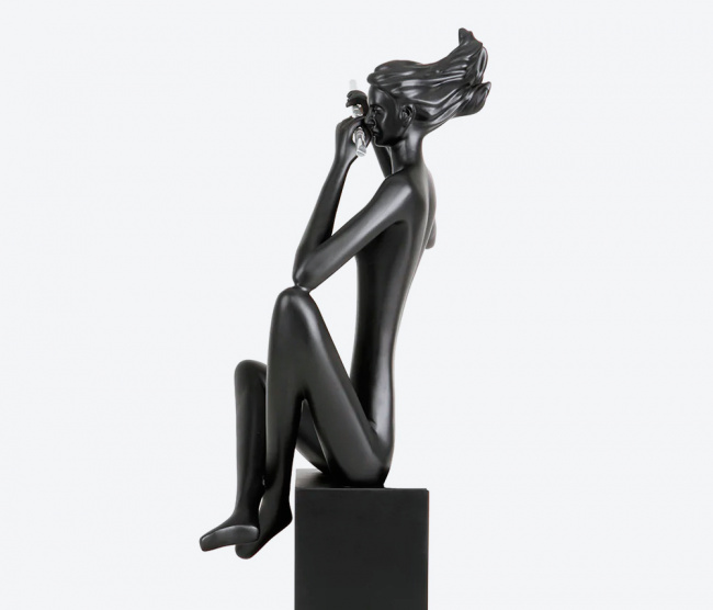 Escultura Flautista