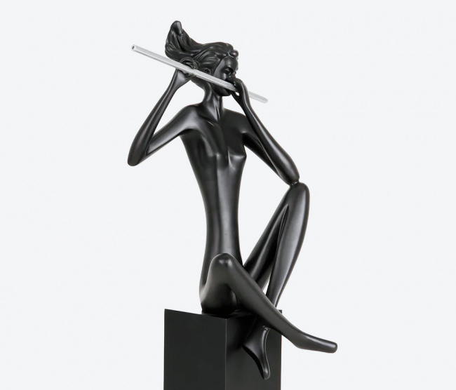 Escultura Flautista