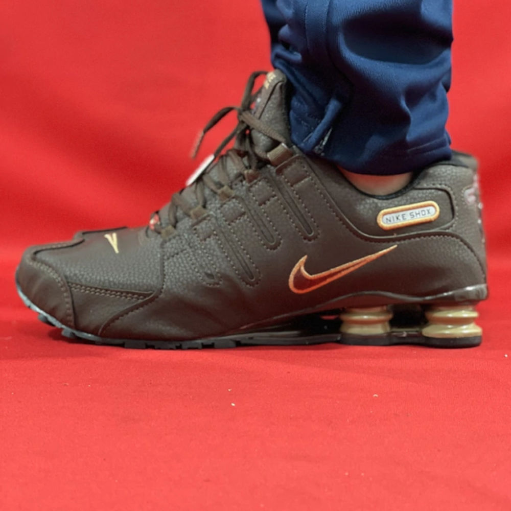 Nike shox 2025 nz dorados