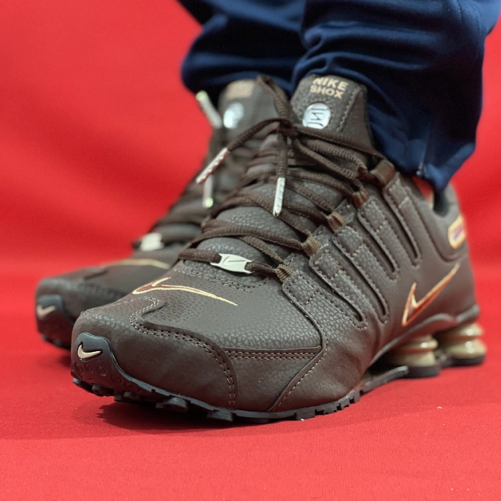 Nike shox hot sale nz dourado